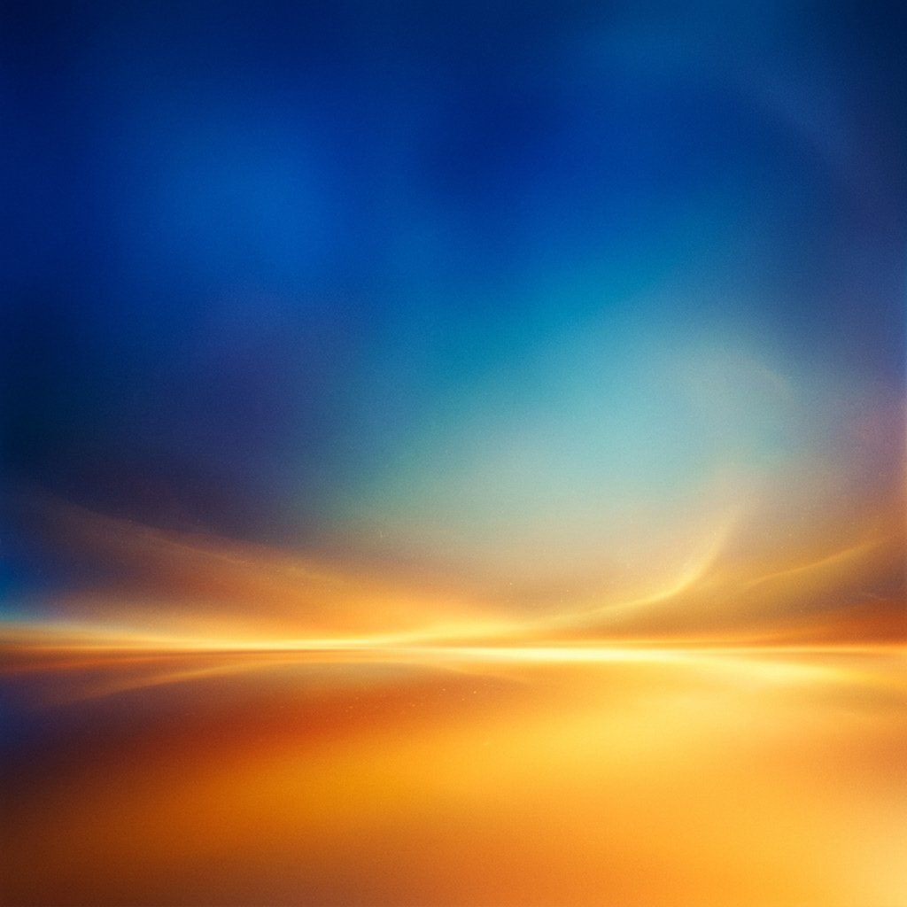 Abstract gradient blending blue, orange, and yellow hues